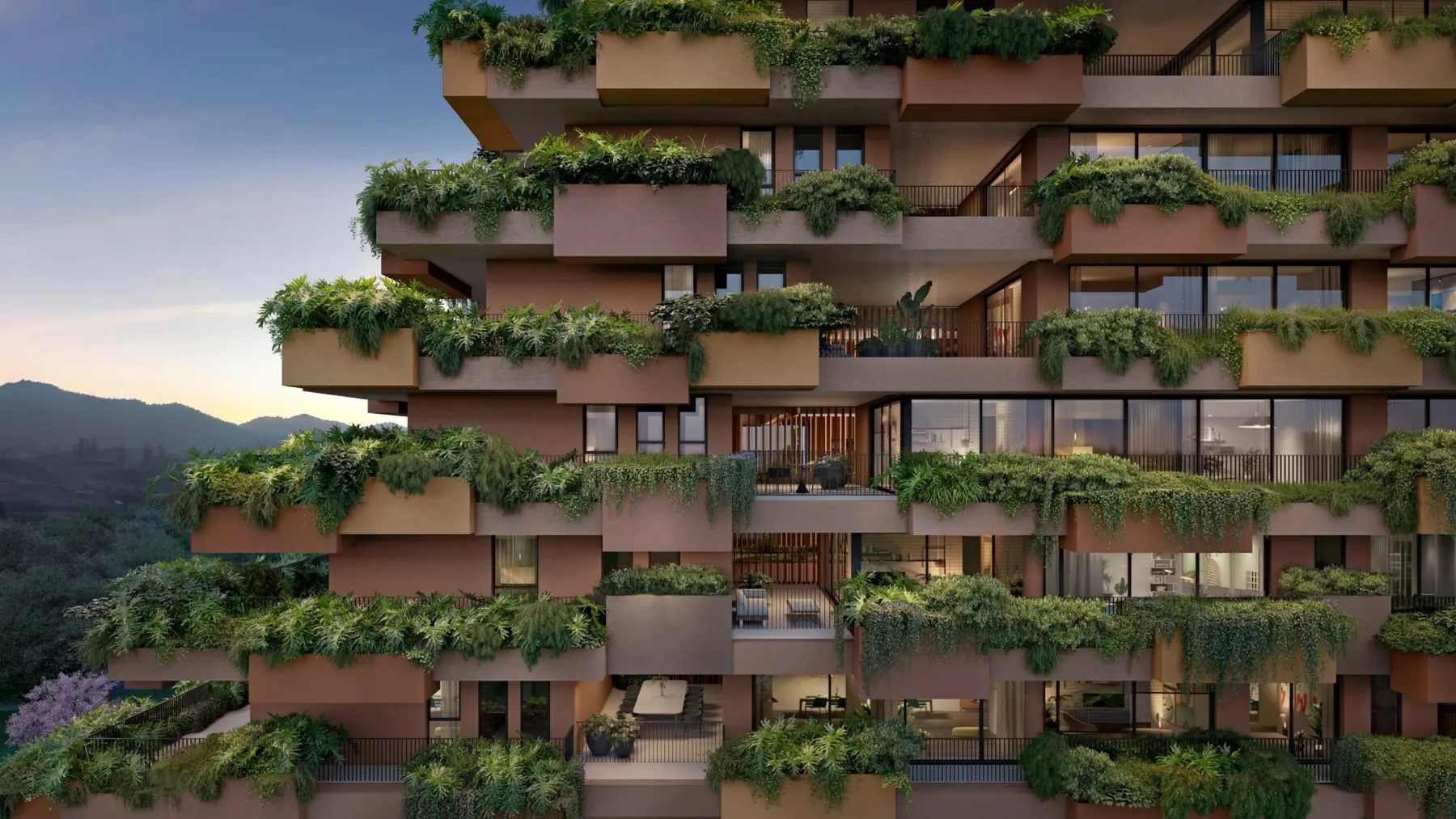 Detalhe da fachada biofílica do TERRA All Resort com vegetação nas varandas